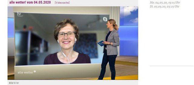 Screenshot Fernsehsendung Buening-Fesel und Moderatorin vor Bildschirm