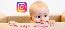 Baby in einem Pappkarton das für Gesund in Leben auf Instagram wirbt